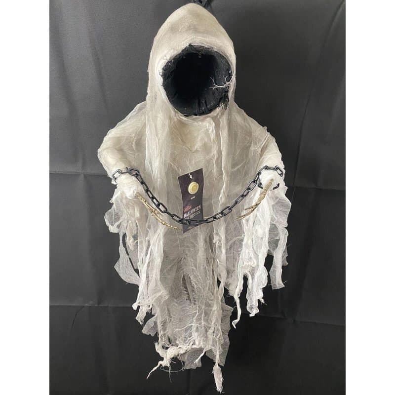 Small Faceless Spectre In Chains
